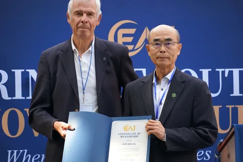 A mentor certificate presentation at the launch celebration.
