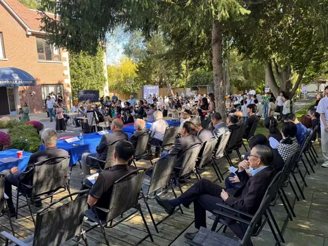 Guests gather outdoors for the launch celebration.